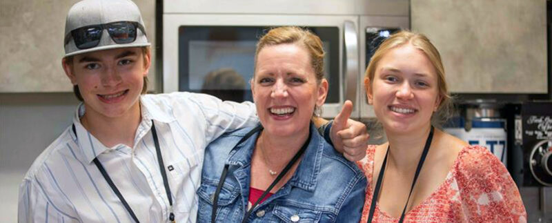 Volunteers at Grace Church serving others with a smile