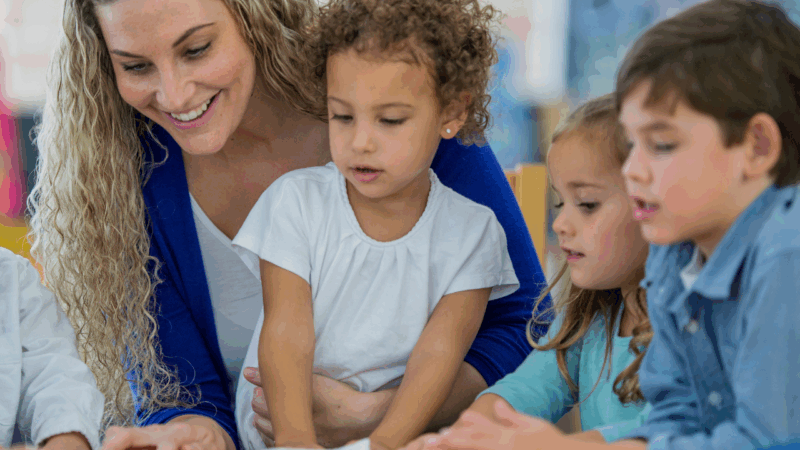 adult teaching kids