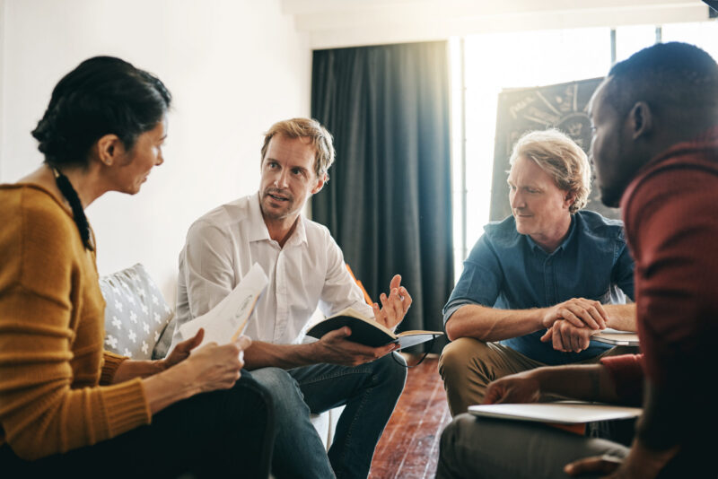 Group of adults in discussion